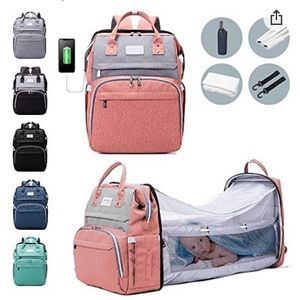Brand new diaper bag with foldable bassinet!